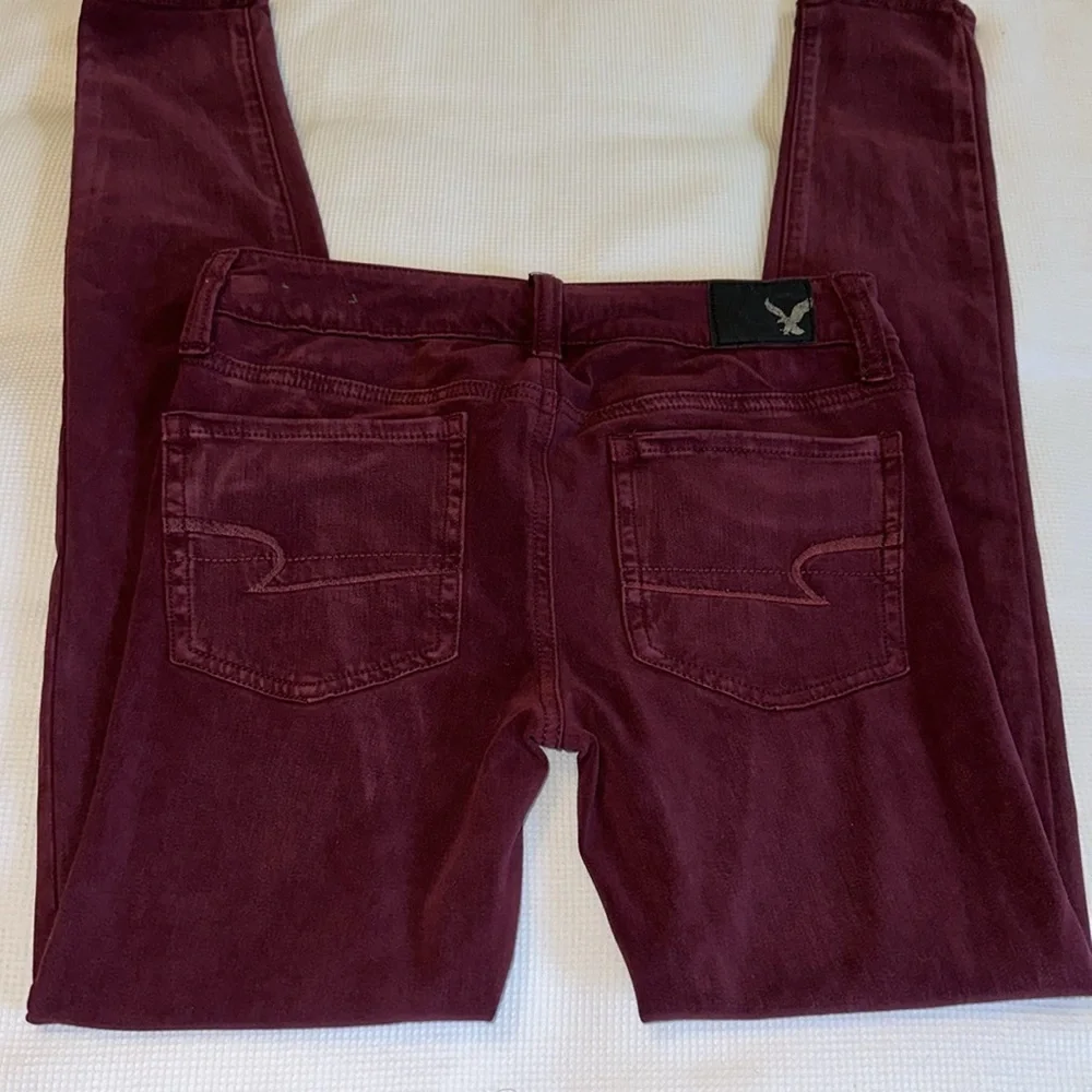American Eagles 360 Super Stretch Jegging Size 0 Regular Burgundy Color